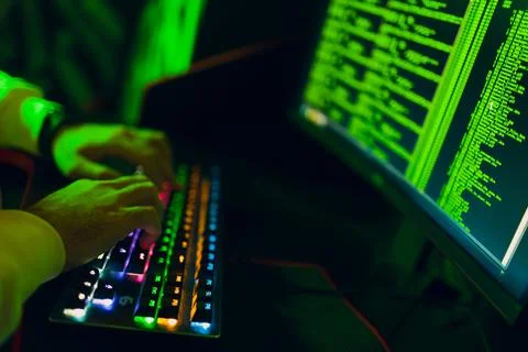 Hacker using computer malware software and hacking binary code digital interface Stock Photos