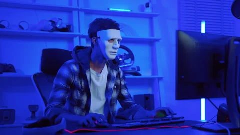 Hacker using a computer to steal confidential information Stock Footage 264780139