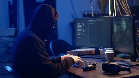 Hacker using computer to target vulnerable unpatched connections Stock Footage 319526296