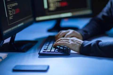 Hacker using computer virus for cyber attack 写真素材