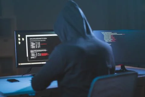 Hacker using computer virus for cyber attack 库存照片