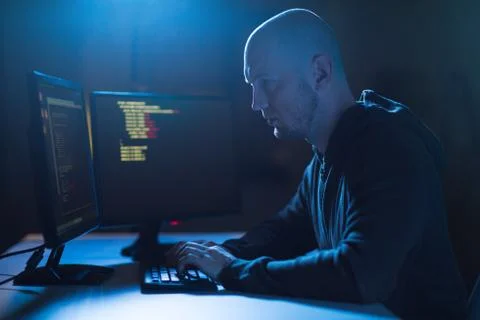 Hacker using computer virus for cyber attack 库存照片