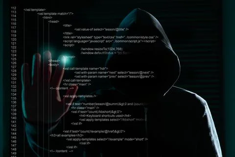 Hacker using digital code on virtual screen in darkness. Cyber crime concept 写真素材