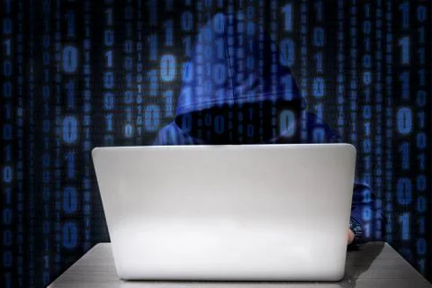 Hacker using keyboard typing bad data into computer online system and sprea.. Stock Photos