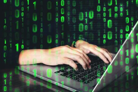 Hacker using keyboard typing bad data into computer online system and spreadi Stock Photos