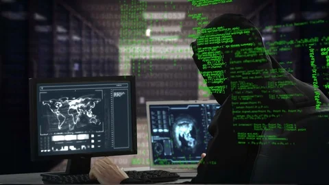 Hacker using a laptop and computer Stock Footage 107683492