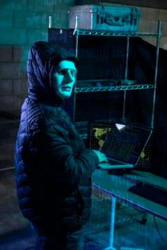 Hacker using laptop with binary code Foto stock