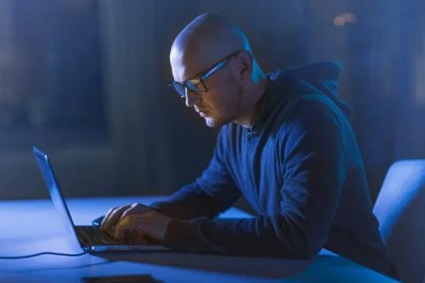 Hacker using laptop computer for cyber attack Foto stock