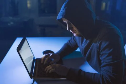 Hacker using laptop computer for cyber attack 스톡 사진