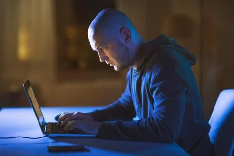 Hacker using laptop computer for cyber attack 스톡 사진