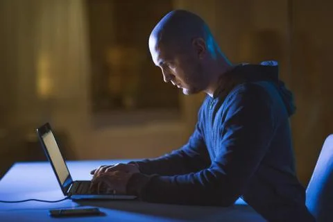 Hacker using laptop computer for cyber attack Foto stock