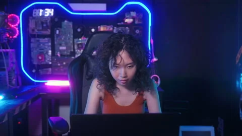 A Hacker is using laptop computer to steal data in the night Видео 232944412