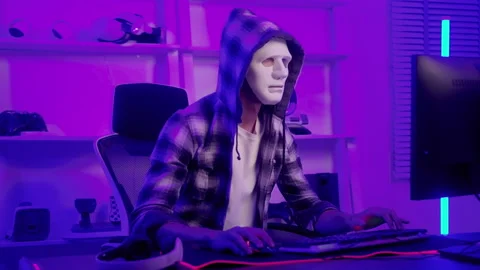 A Hacker is using laptop computer to steal data in the night.. Stock Footage 236261027