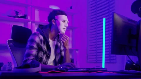 A Hacker is using laptop computer to steal data in the night.. Stock Footage 236261212