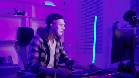 A Hacker is using laptop computer to steal data in the night.. Stock Footage 236261285