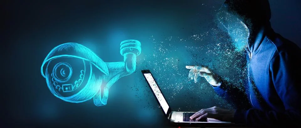 Hacker using laptop with cyber security system Stock Photos