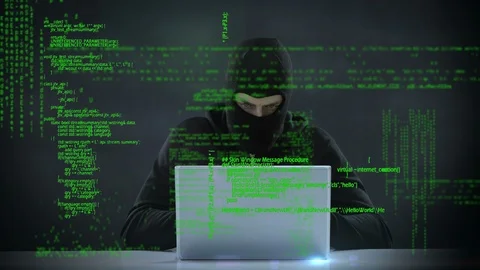 Hacker using a laptop Stock Footage 107677726