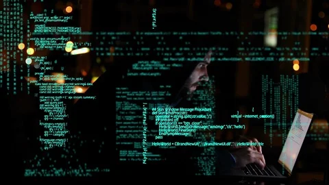 Hacker using a laptop Stock Footage 107681642