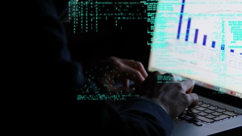 Hacker using a laptop Stock Footage 107685850