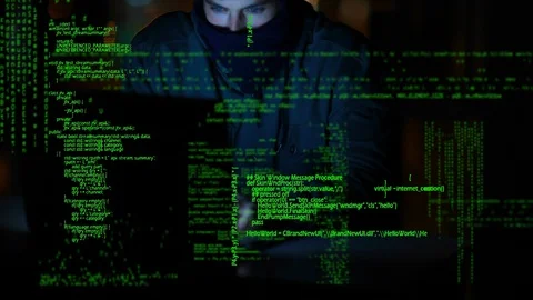 Hacker using a laptop Stock Footage 107687450