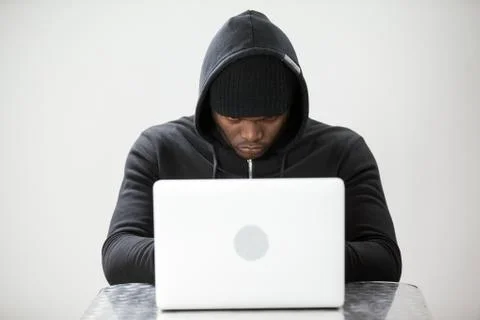 Hacker using a laptop 写真素材