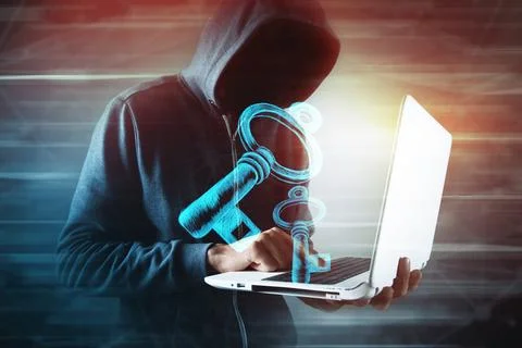 Hacker using laptop to protect information from cyber attack on digital tab.. Stock Photos