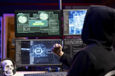 Hacker using malicious virus and AI deep learning tech to compromise devices Stock Photos