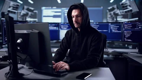 Hacker Using Spy Software For Data Theft Stock Footage 318325143