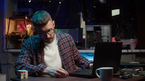 Hacker using usb flash drive close-up. Young man developing program, IT Stock Footage 166859469