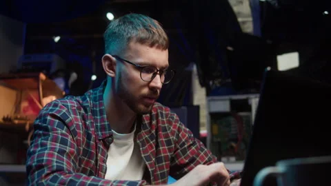 Hacker using usb flash drive close-up. Young man developing program, IT Video stock 228685857