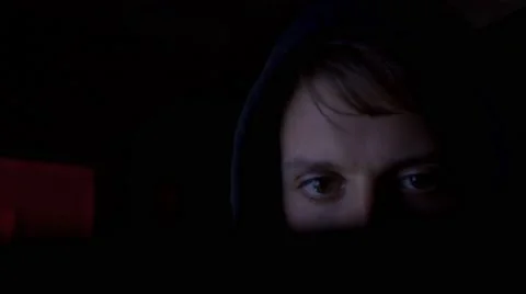 Hacker in VR glasses cracking code using computers in dark room close up Stock Footage 68901409