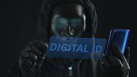Hacker wearing black mask pulls DIGITAL ID tab from a smartphone. Hacking Stock-Illustration
