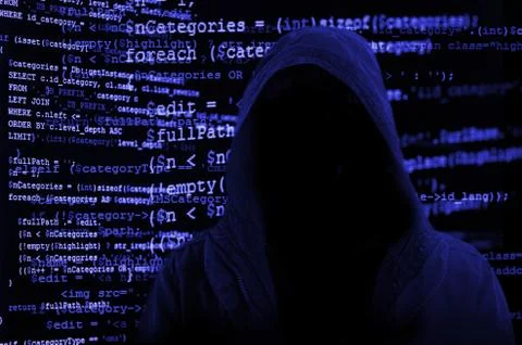 Hacker without face surrounded by source code Foto stock