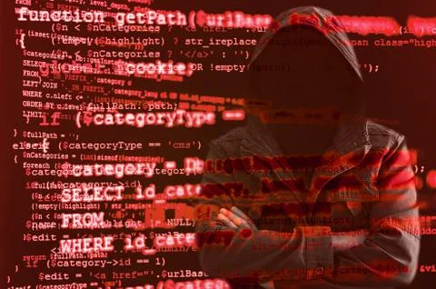 Hacker without face surrounded by source code Foto stock