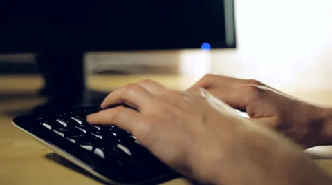 Hacker working on computer at night Stock Footage 59184087