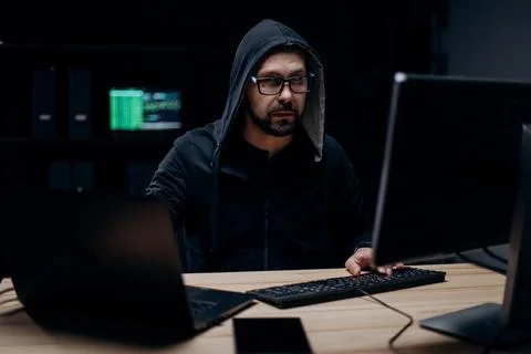 Hacker working on computer Stock Photos