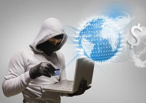 Hacker working on laptop in front of digital earth on grey background Foto stock