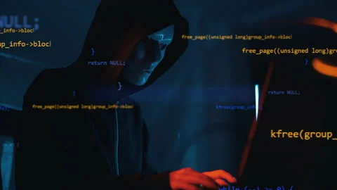 Hacker is working on laptop at night. Hands are typing a virus code at keyboard Stock Footage 164560213