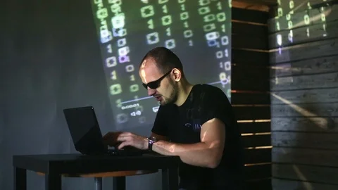 The hacker works behind the computer Stock Footage 99373839