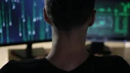 Hacker Works At A Computers  In A Dark Office Room. Stock Footage