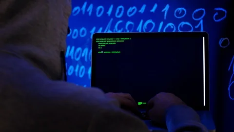 Hacker writing programming code or using virus program for cyber attack. Stock Footage 106369701