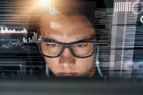 In the hacker zone. a hacker cracking a computer code in the dark. 스톡 사진