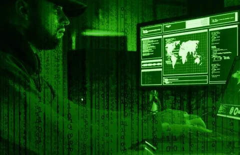 Hackers are breaking server using computers. Cybercrime concept. Stock Photos