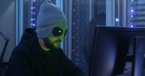 Hackers breaking into a data center Foto stock
