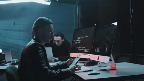 Hackers Committing Cyberattack from Dark Hideout Video stock 156749878