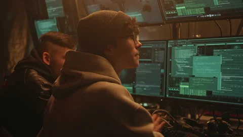 Hackers committing cybercrime in hideout Stock Footage 170187504