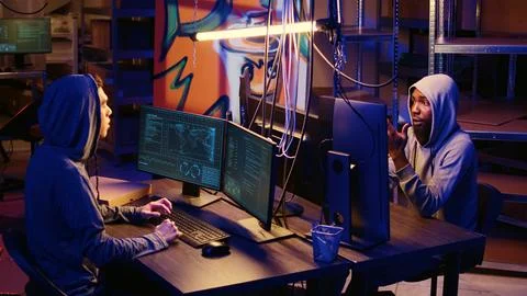 Hackers creating software pirating crack 스톡 사진