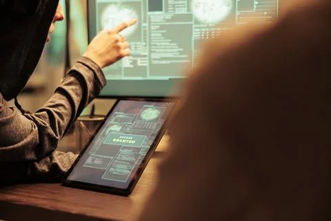 Hackers gettng access to important database online on computer network Stock Photos