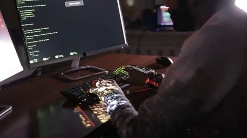 Hacker's hands typing codes on the keyboard. Hacks program code, software code Stock Footage 69207390