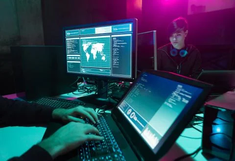 Hackers making cryptocurrency fraud using virus software and computer interface Stock Photos